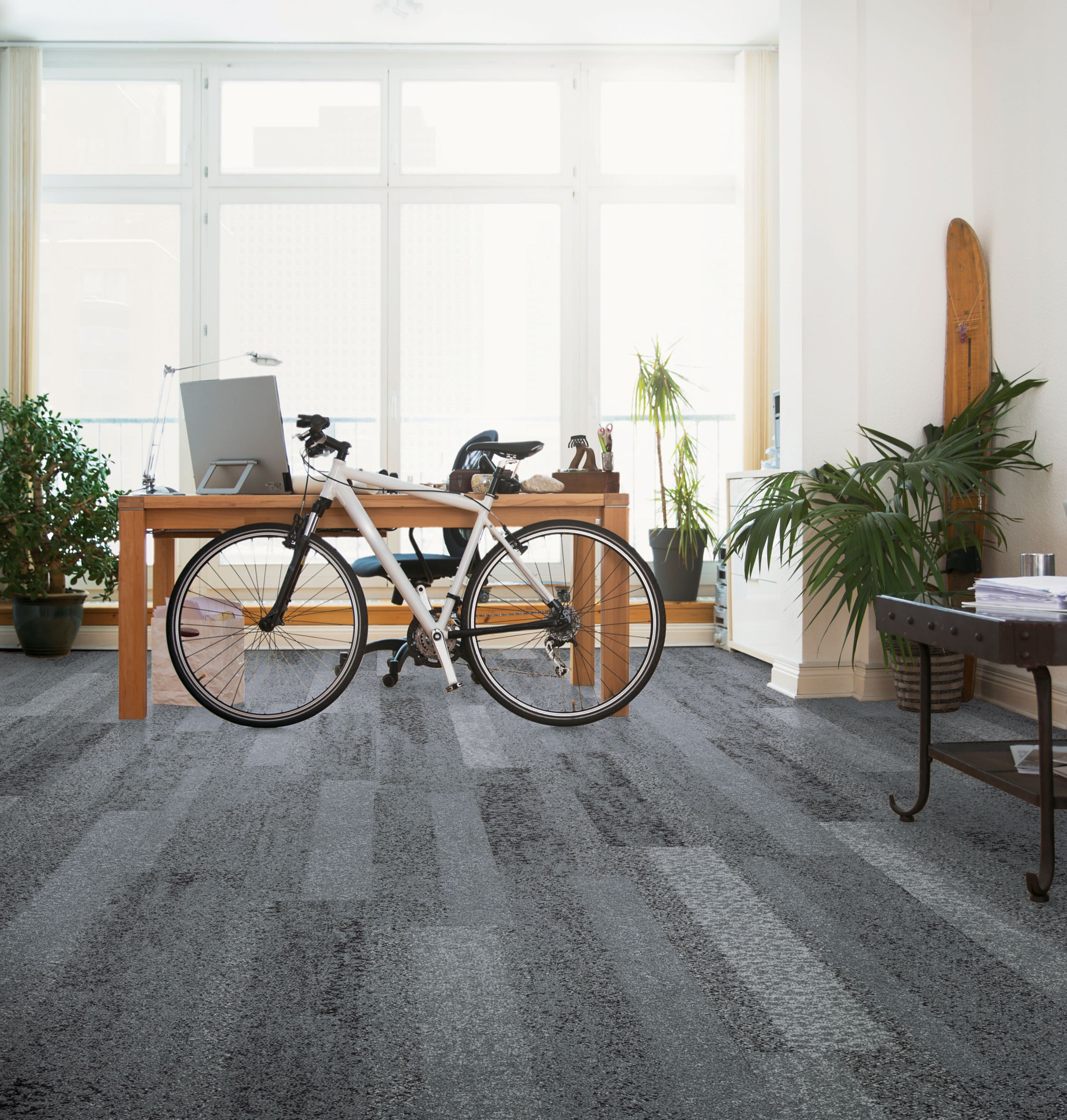 Interface Nature's Course plank carpet tile in private office with desk and bike imagen número 1